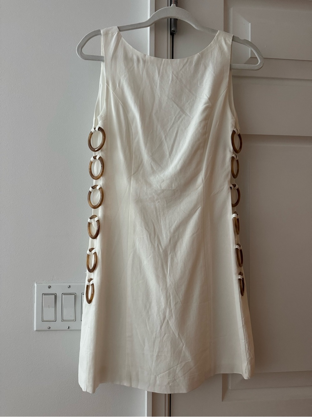 Sleeveless Cream Ring-Detail Shift Dress